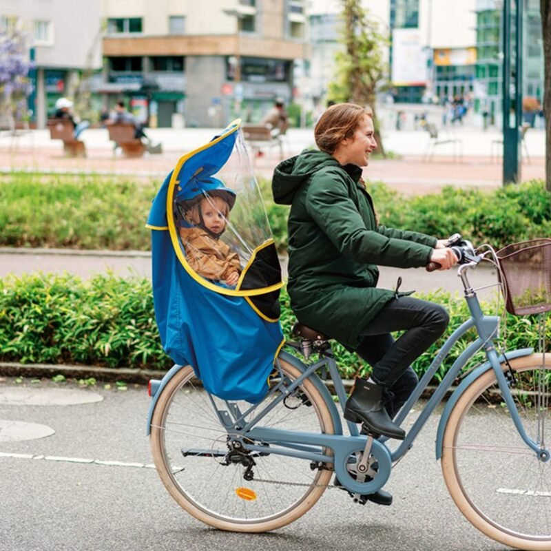 Protection enfant Bub-Up Kids Sun & Rain montée sur siège vélo